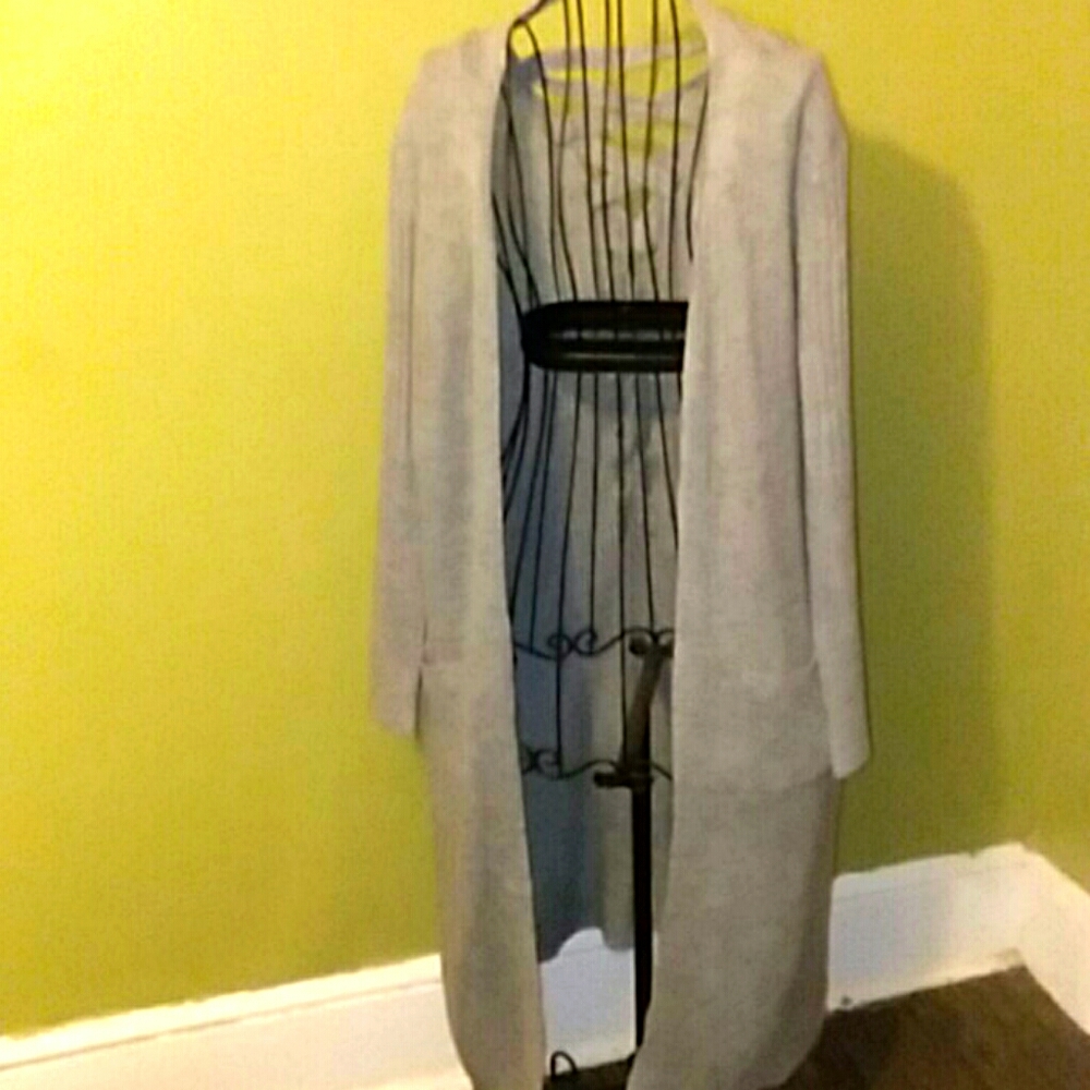 A gray quarter length cardigan